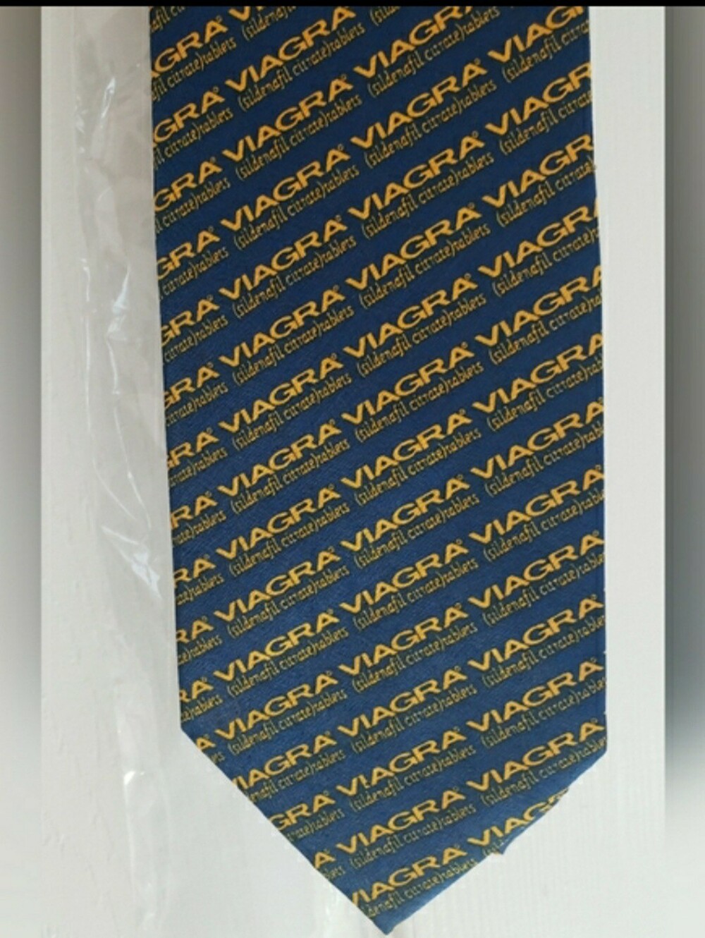 Promotional tie from its introduction by PFIZER. Has Been In Plastic.